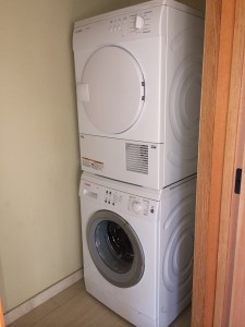 Interior Laundry Room featuring stackable washer/dryer