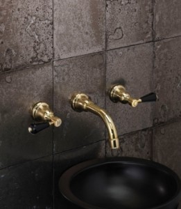 Fairfield in unlacquered brass with Black Crystal, NOT porcelain, levers.