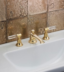 Style Moderne in unlacquered brass with simple crystal levers